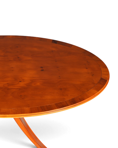Hauptstadt Möblerei runder Esstisch aus braunem Holz mit eleganter Maserung und glattem Finish