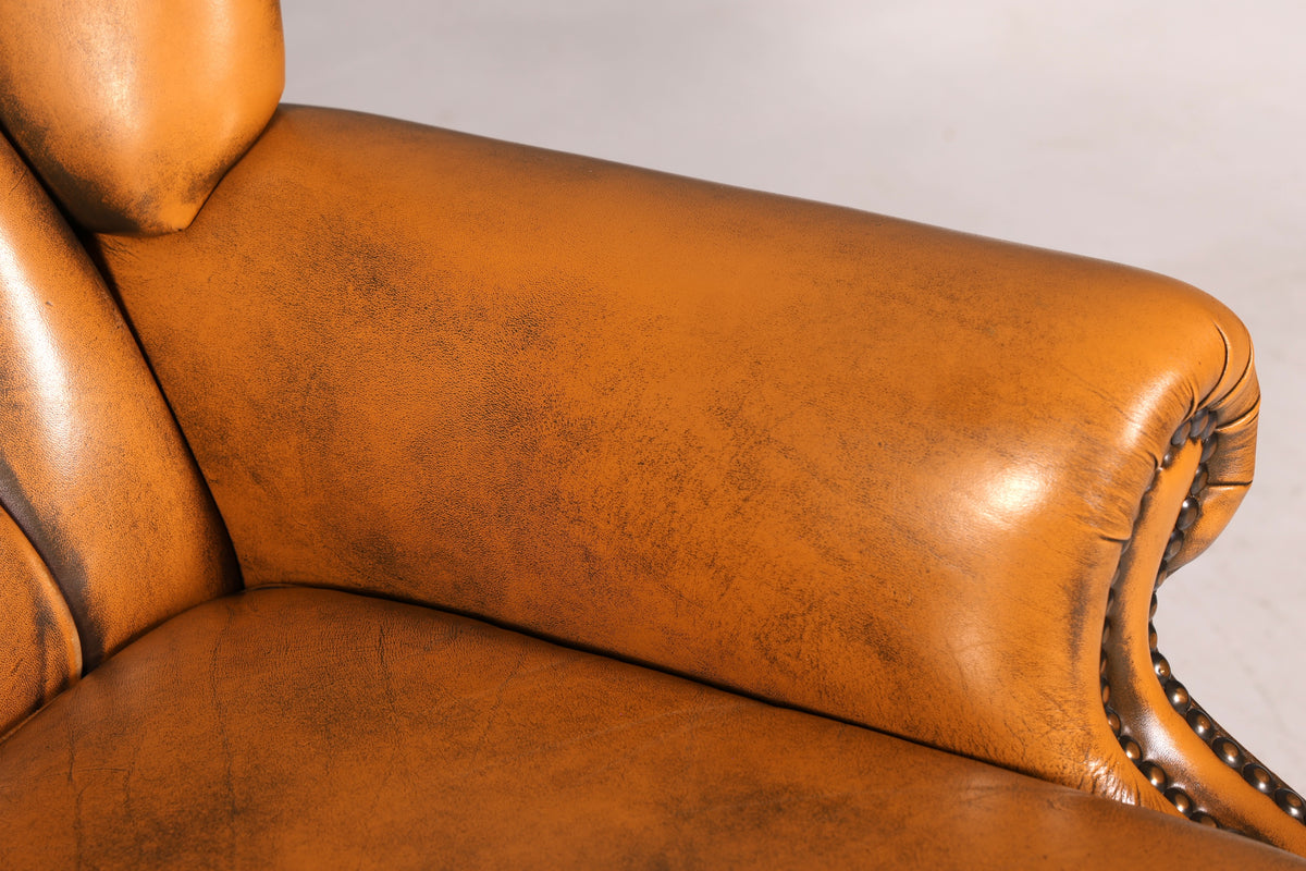 Beautiful original Chesterfield wingback armchair, English genuine leather gentleman’s chair, recliner with reclining function, vintage