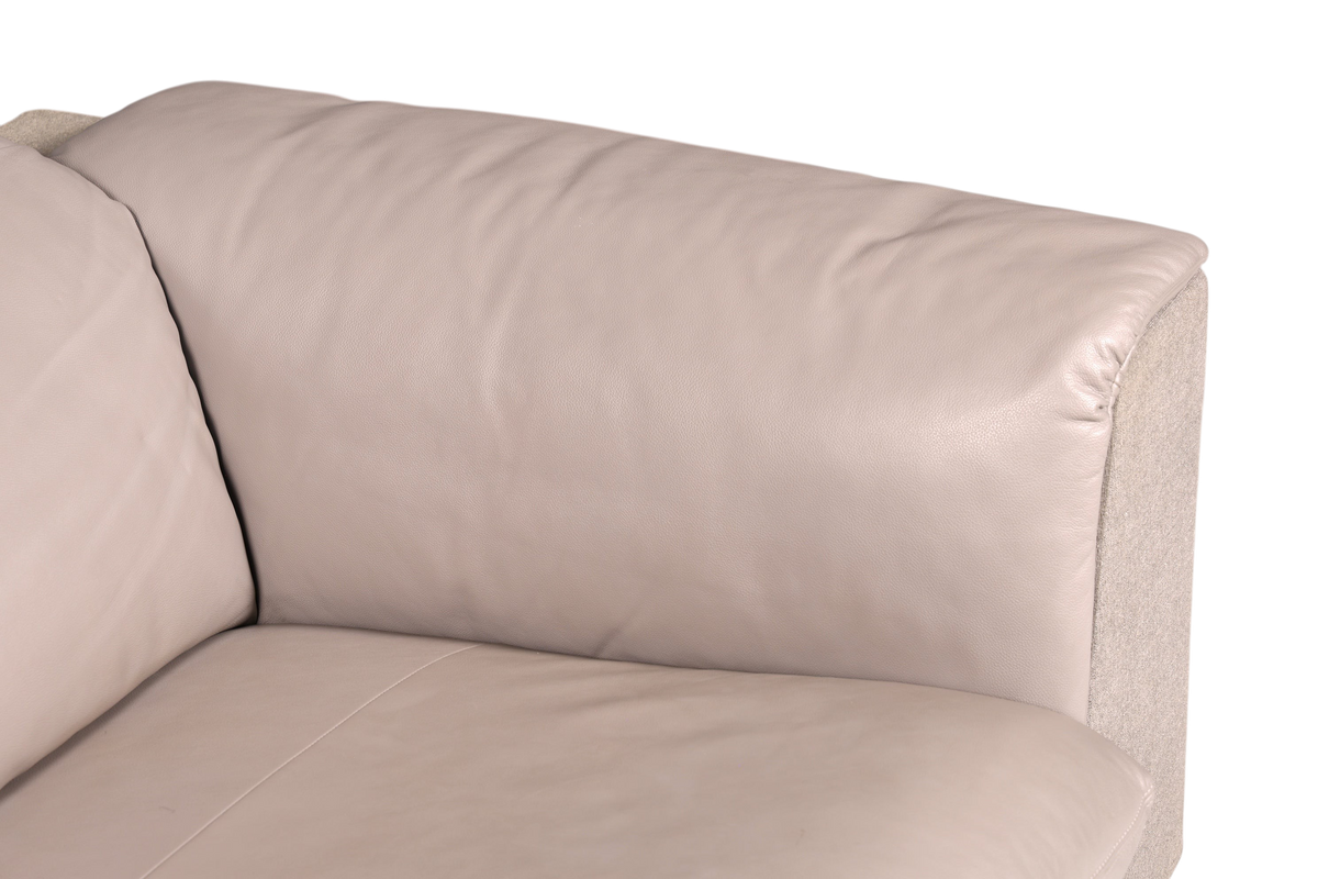 Hauptstadt Möblerei Ligne Roset tasarım gri deri ve kumaş koltuk detayı