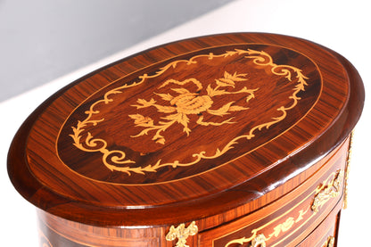 Beautiful oval Baroque style chest of drawers, vertico with inlaid details, 7 drawers