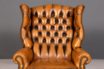 Beautiful original Chesterfield wingback armchair, English genuine leather gentleman’s chair, recliner with reclining function, vintage